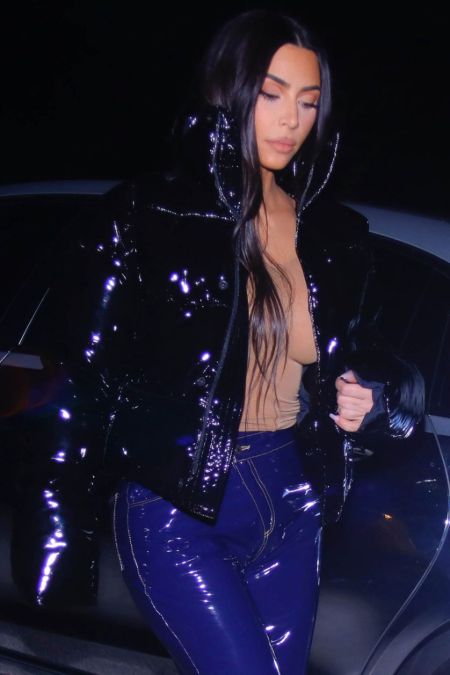 Kim Kardashian seen without a wedding ring after filing for divorce.